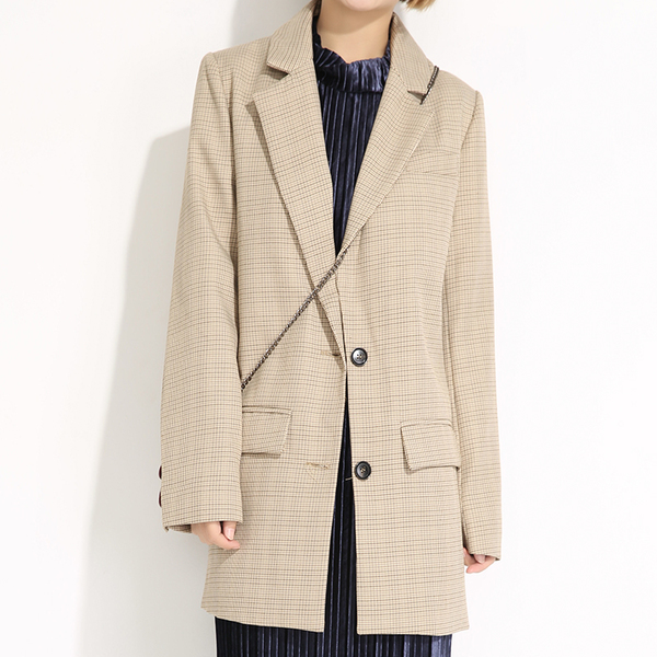 Chú ý đến thiết kế của áo vest cả về kiểu dáng, form áo,...