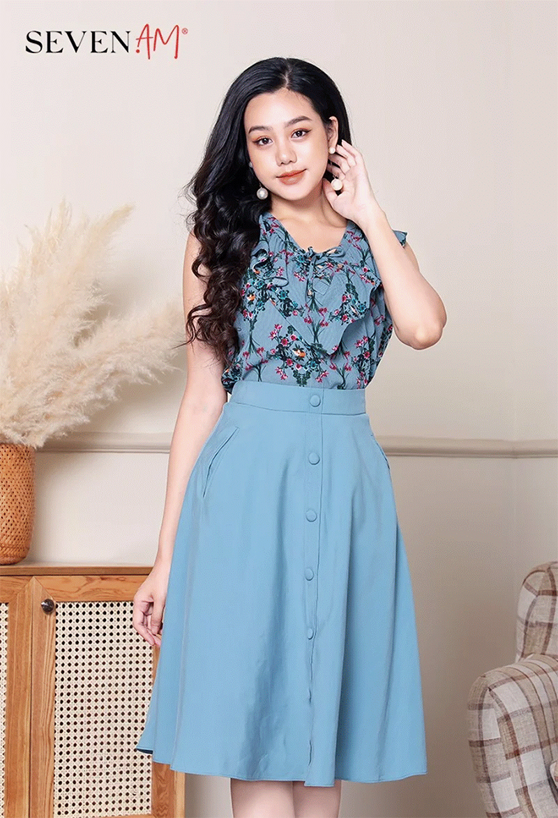 Chân váy công sở dáng xòe cạp cao xanh kết hợp áo hoa