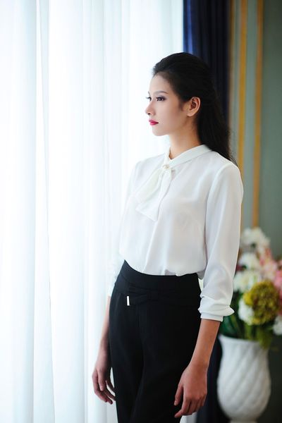 ao-so-mi-nu-trang-dang-co-that-no