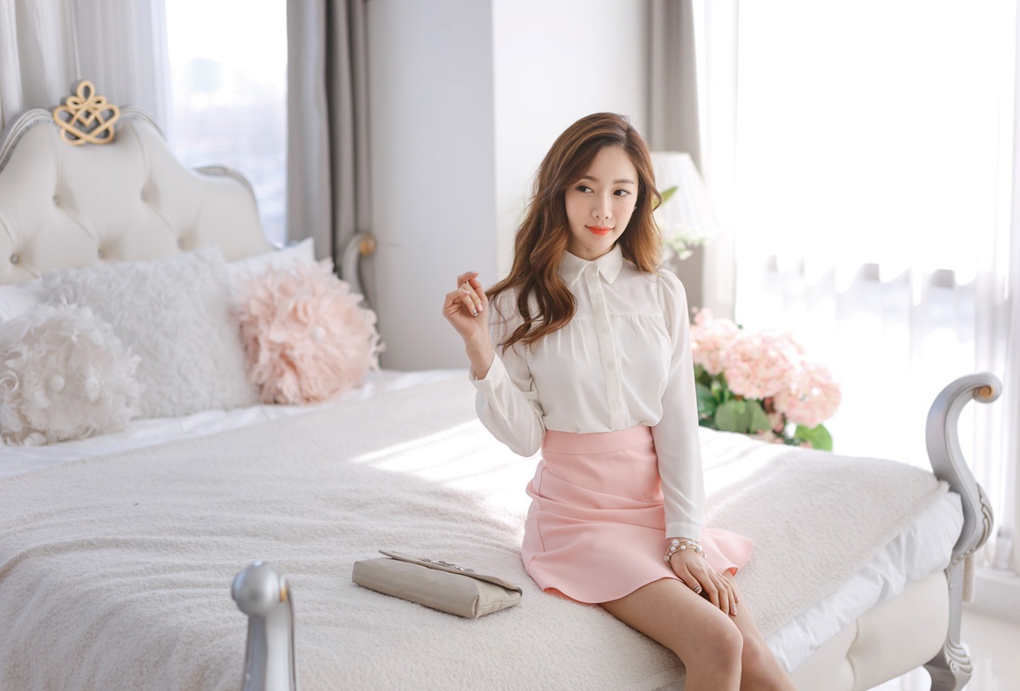 ao-so-mi-trang-nu-dep-co-tru-xep-li