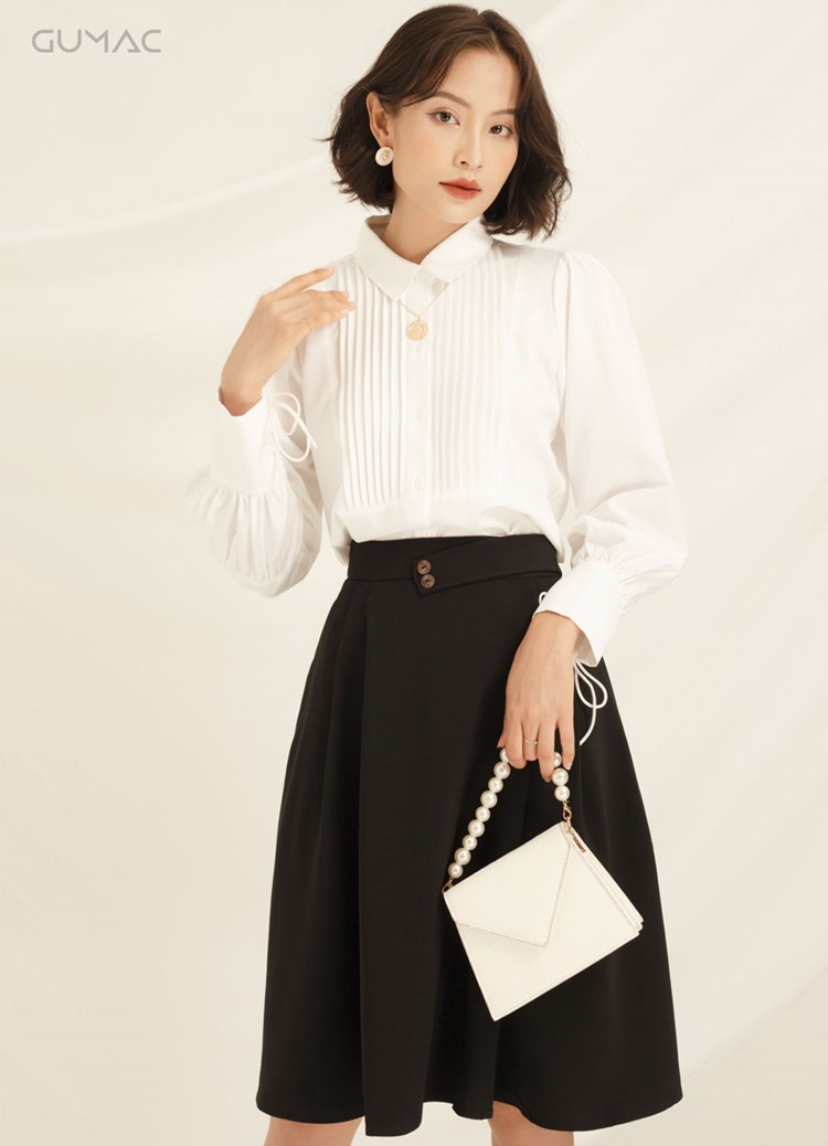 Sơ mi trắng xếp ly phối chân váy chữ a đen